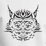 татуировка в виде фантастического лица