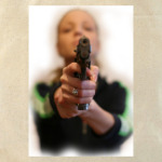 Девушка с оружием