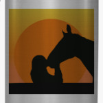 Девушка целует лошадь